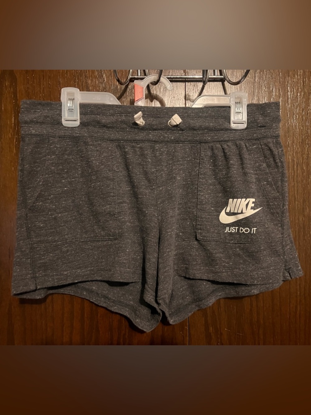 Nike Dark Gray Shorts with White Drawstring and Red Tag